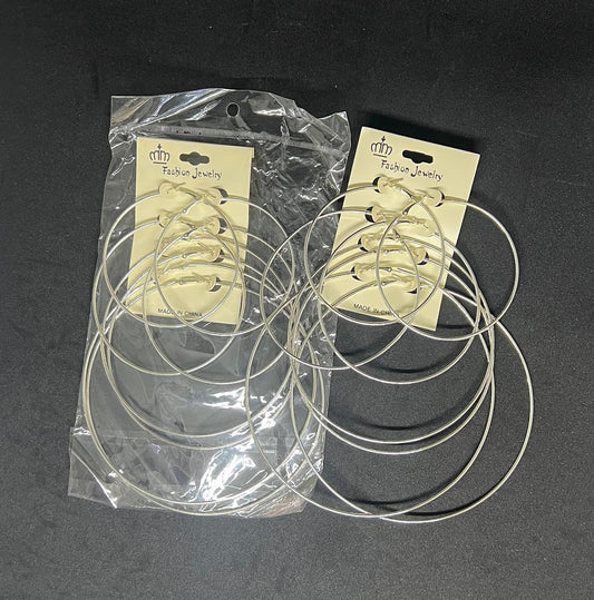 Argollas Plateadas – Docena de Paquetes (4 pares c/u)